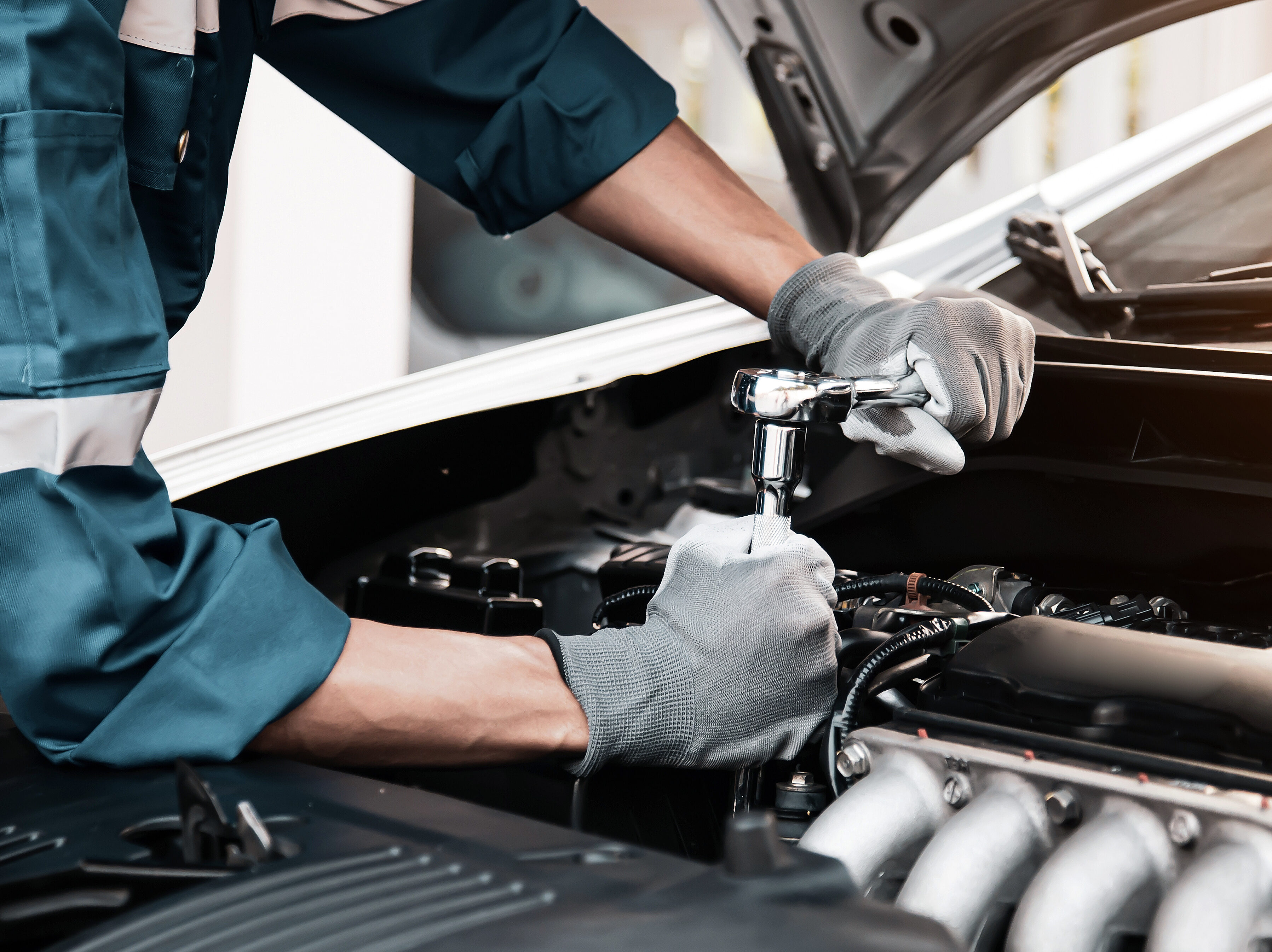 Car care maintenance and servicing, Close-up hand technician aut